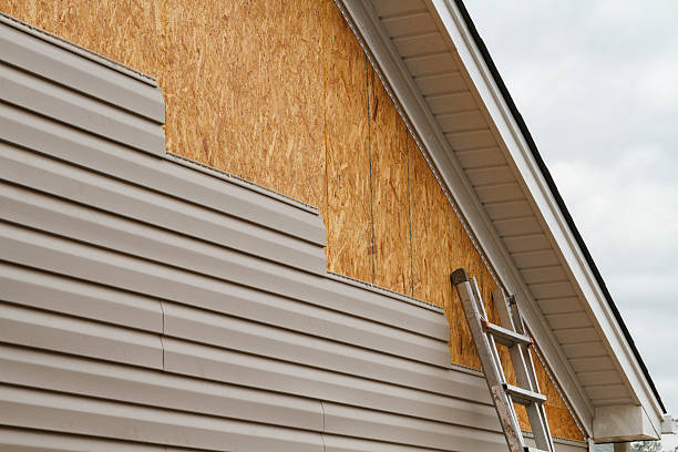 Professional Siding technician working in Woodleaf, NC